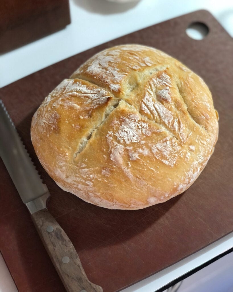 fresh baked bread on cutting board
