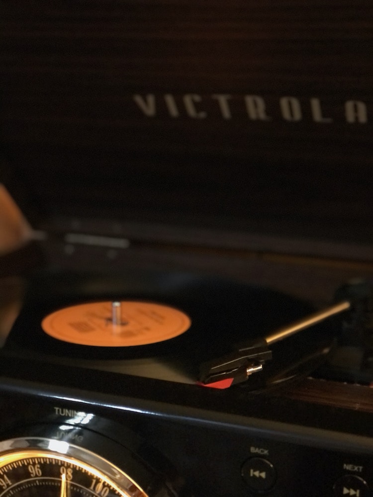 old-fashioned vinyl record player playing a record