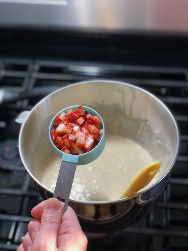 cut strawberries to go into pancake batter